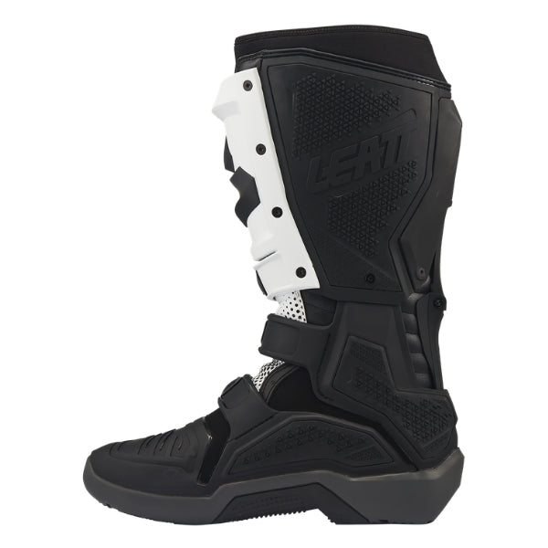 Leatt Moto 5.5 FlexLock Enduro Evo boots in Black/White, inner-side profile showing the protective heat-shield panel