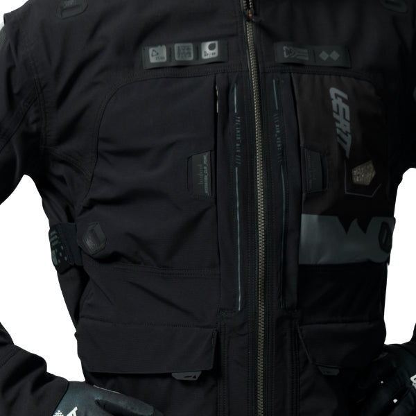 Leatt Moto 6.5 HydraDri Jacket in Black, front detail showing the chest and lower storage pockets