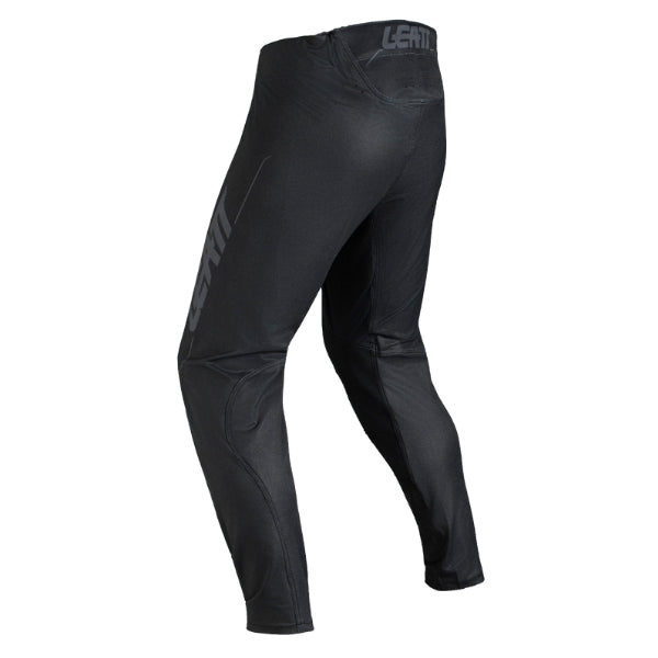 Leatt Moto 5.5 IKS Pants in Black, rear view showing the seat, knee, and lower-leg panels