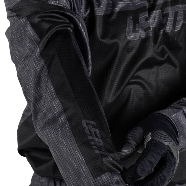 Product photo showing Leatt, V26 Moto 3.5 Jersey in Stealth Black/Grey, Colors: Blue, Brown, Orange, Red, Retro Pink, Stealth Black/Grey, Storm Teal, Sizes: 2-5, SKU: 5026020542