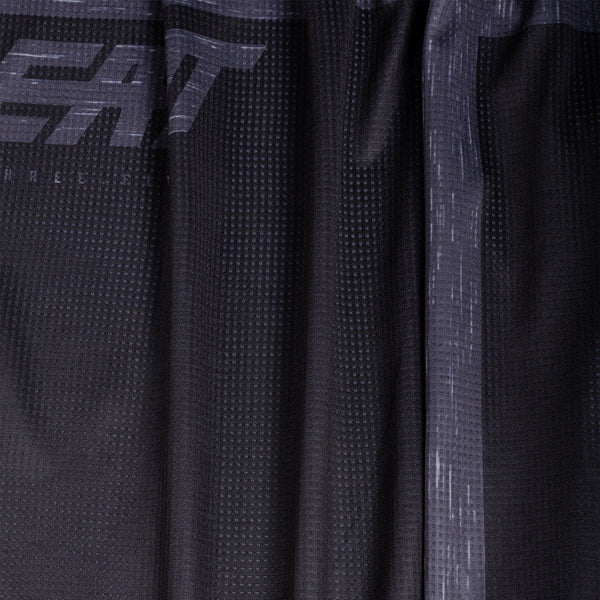 Product image of Leatt, V26 Moto 3.5 Jersey in Stealth Black/Grey, Colors: Blue, Brown, Orange, Red, Retro Pink, Stealth Black/Grey, Storm Teal, Sizes: 2-5, SKU: 5026020542