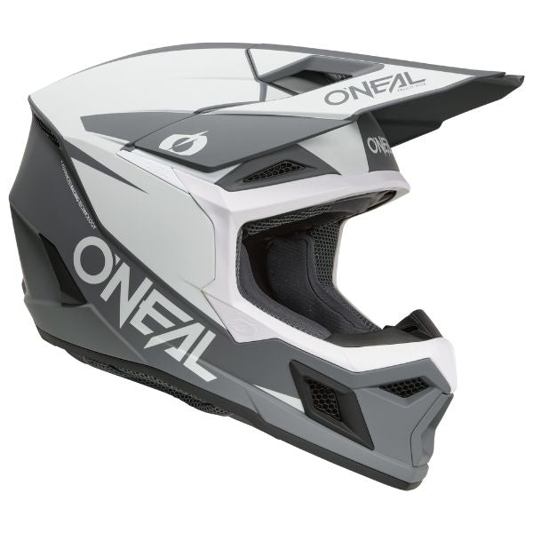 Catalog studio image of O'Neal, 3 Series Solid Helmet, SKU 0625-092, color options Black/Grey, White/Black, sizes XS–2X