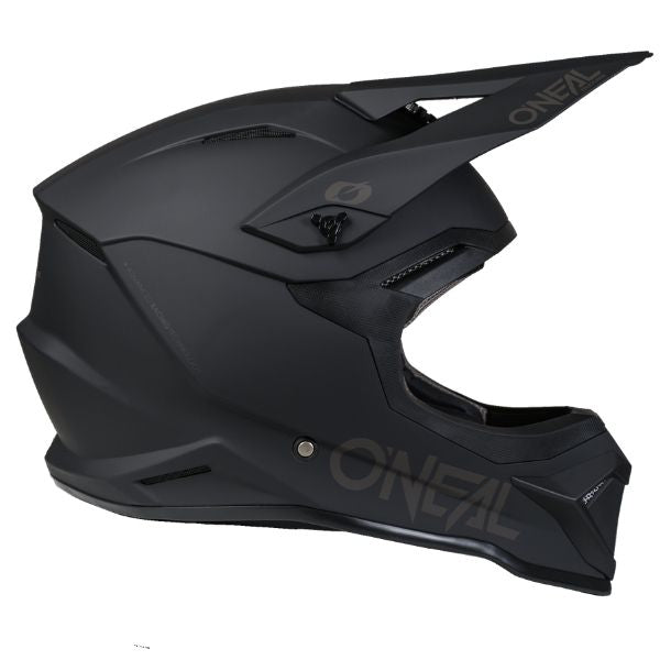 Studio product photo on a neutral background of O'Neal, 4 Series Solid Helmet, SKU 0626-115, color options Black/Grey, Grey/Black, sizes XS–2X