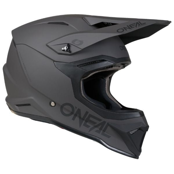 Studio image highlighting O'Neal, 4 Series Solid Helmet, SKU 0626-211, color options Black/Grey, Grey/Black, sizes XS–2X