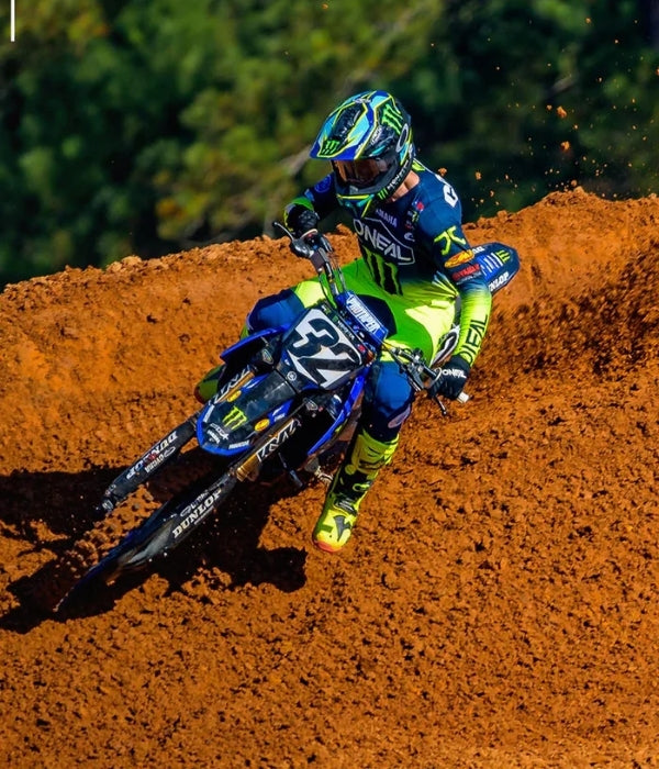 Motocross rider in action on a dirt track with a blurred background Mayhem Hexx Combo O'Neal collection