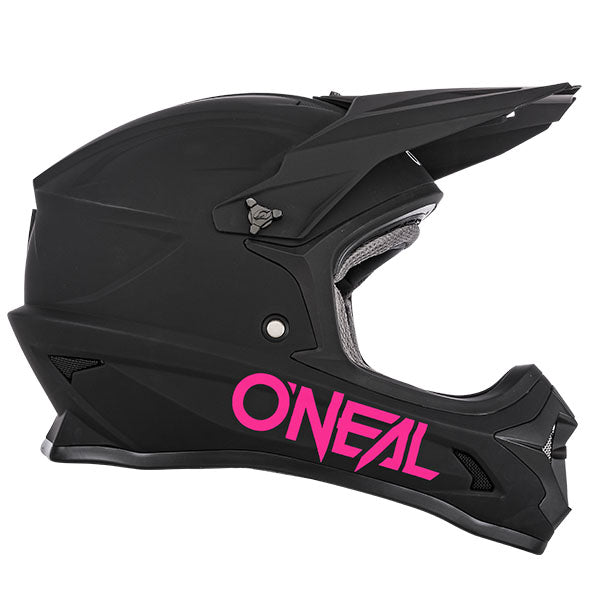 Clean studio photo on a white background of O'Neal, 1 Series Solid Helmet (Girls), color options Black/Pink, sizes Y-SM, Y-MD, Y-LG, Y-XL