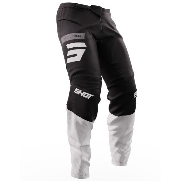 Right side view of Shot Race Gear Reflex Pants black—ultra-light (≈450 g), 600D chassis, stretch panels, leather heat guards; vented liner. Sizes 28–42. SKU A08-11C1-A01-28.