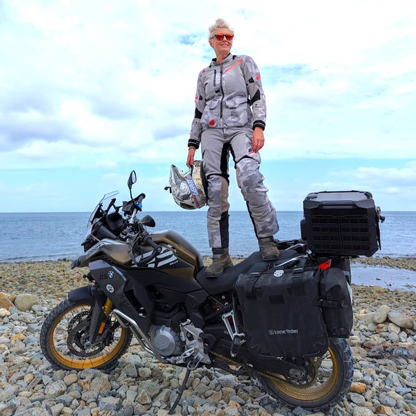 woman standing on bike. adventure bikes collection