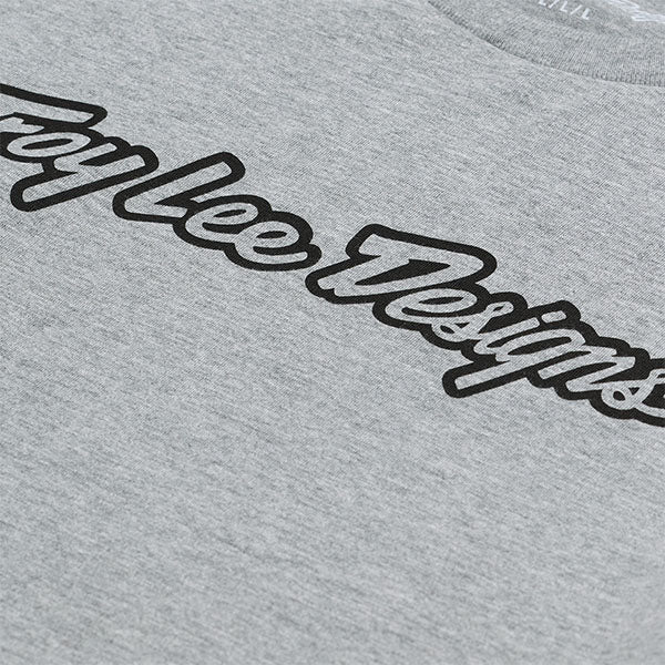 High-resolution studio image of Troy Lee Designs Signature Long Sleeve Tee; showing long-sleeve cut, printed graphics, and crew neckline; SKU 7299170