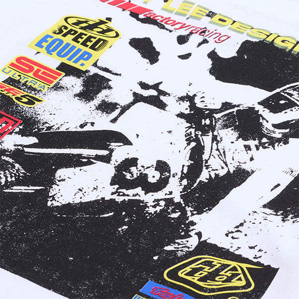 High-resolution studio image of Troy Lee Designs Overload Long Sleeve Tee; showing long-sleeve cut, printed graphics, and crew neckline; SKU 7292520