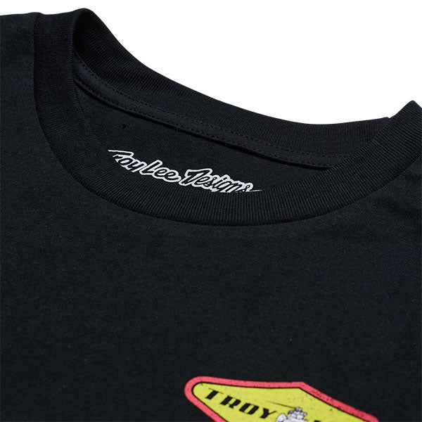 Studio photo on a white background of Troy Lee Designs Overload Long Sleeve Tee; showing long-sleeve cut, printed graphics, and crew neckline