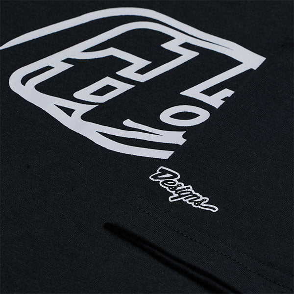 Studio photo on a white background of Troy Lee Designs Badge Tee (Youth); showing tee fit, printed graphics, and crew neckline; SKU 7245680