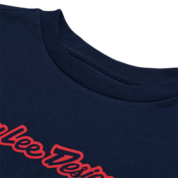 Professional studio photo of Troy Lee Designs Signature Tee (Womens); showing tee fit, printed graphics, and crew neckline; SKU 7539170; Sizes: S-XL