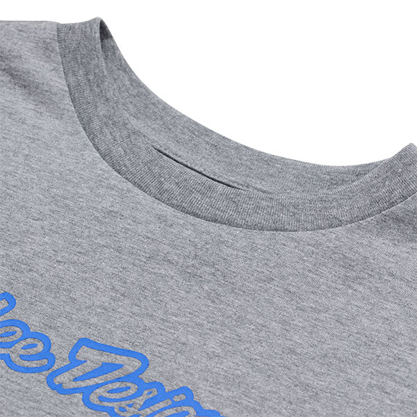 Professional studio photo of Troy Lee Designs Signature Tee (Womens); showing tee fit, printed graphics, and crew neckline; SKU 7539170; Sizes: S-XL