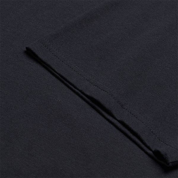 High-resolution studio image of Troy Lee Designs Paint Shop Tee; showing tee fit, printed graphics, and crew neckline; SKU 7017290; Colors: Carbon, White