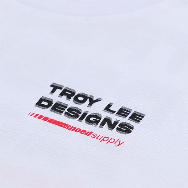 Clean studio shot of Troy Lee Designs Factory Tee; showing tee fit, printed graphics, and crew neckline; SKU 7018180; Colors: White, Black; Sizes: S-2XL
