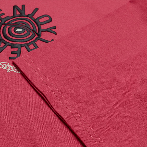 Clean studio shot of Troy Lee Designs Enjoy Tee; showing tee fit, printed graphics, and crew neckline; SKU 7017280; Colors: Fuchsia, Carbon; Sizes: S-2XL