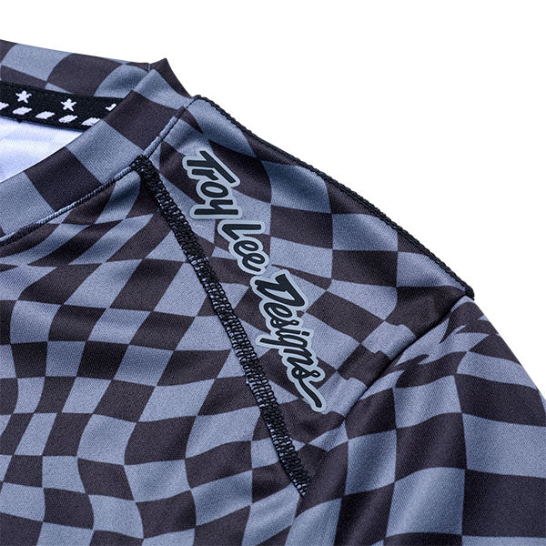 Product image of Troy Lee Designs - Lilium Twisted Checkers Long Sleeve Jersey (MTB) (Womens) SKU:358516002 | Sizes: SM–XL | Designed for Mountain Bike, BMX and E-Bike riders | Available at BTO Sports