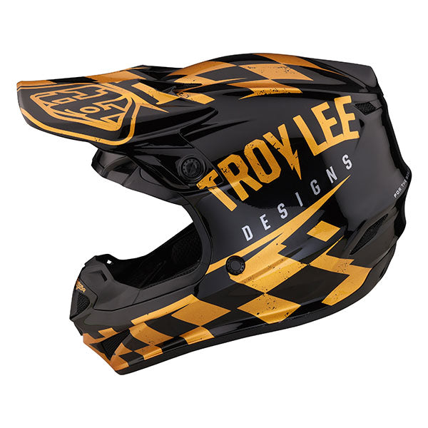 Image of Troy Lee Designs SKU 1090420 SE4 Polyacrylite Race Shop MIPS Helmet Size: XS Colors: Black/Gold (SKU 1090420)