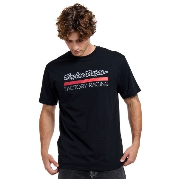 Studio photo on a white background of Troy Lee Designs Factory Racing Tee; showing tee fit, printed graphics, and crew neckline; SKU 7016690
