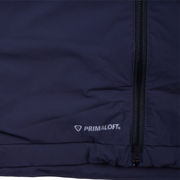 Troy Lee Designs Skyline Pro Mono mountain bike jacket in Carbon, worn by a rider, showing the overall fit, front closure, and color-blocked panels