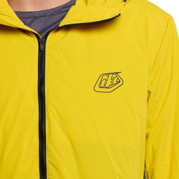 Troy Lee Designs Skyline Pro Mono mountain bike jacket in Acid, close-up highlighting the chest area, visible zipper, branding, and fabric construction