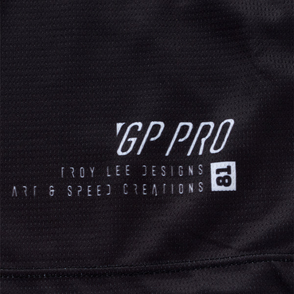 Professional studio photo of Troy Lee Designs - GP Pro Swerve Jersey; showing fabric texture, panel layout, and graphics; SKU 3778680; Sizes: S-2XL