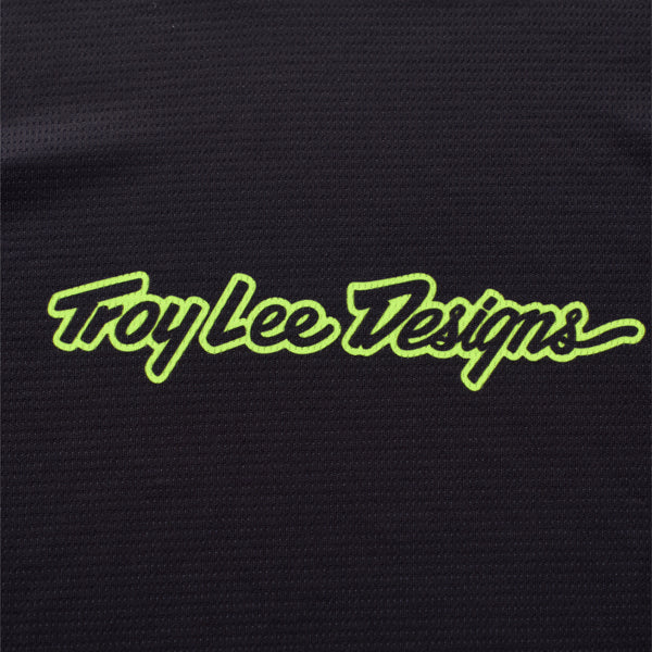 Clean studio shot of Troy Lee Designs - Scout GP Pro Slab Jersey; showing fabric texture, panel layout, and graphics; SKU 3918660; Colors: Black, Timber
