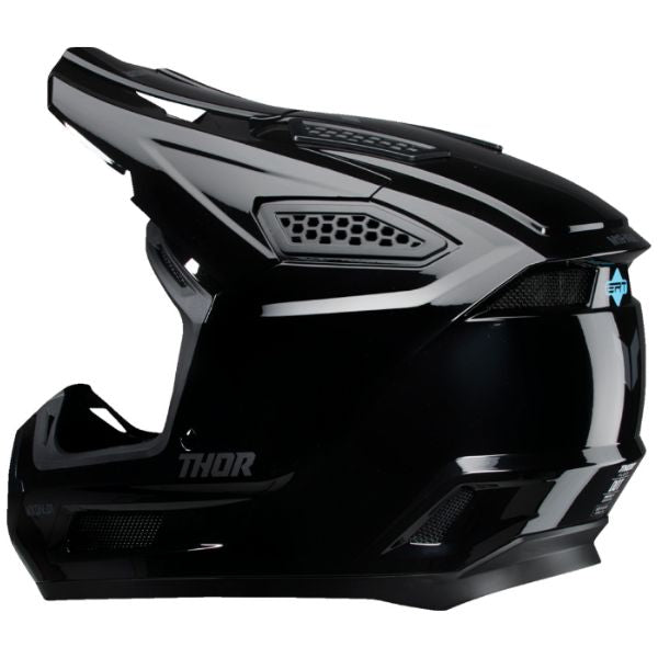 Studio view of Thor - Fleet Blackout Helmet (Youth) helmet helmet, in Gloss Black, vented chin bar and intake ports, on a clean white background, (SKU 011116) Colors: Gloss Black, Matte Black Sizes: Y-LG, Y-MD, Y-SM