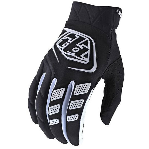 Product image of Troy Lee Revox Gloves black c4de65f4 bd8c 465a 80cd 3b31608af2bb motocross gloves showing fit, construction, and colorway | Available at BTO Sports