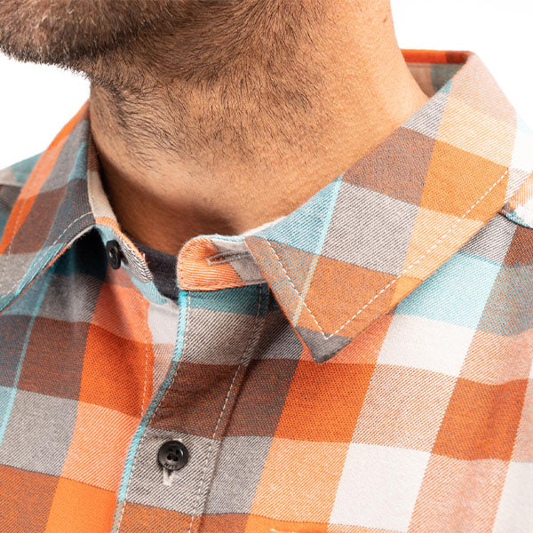Studio photo on a white background of Klim; showing flannel shirt fit, button front, and plaid pattern; SKU 3636-000-150-402