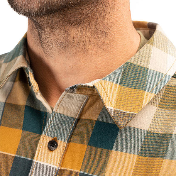 Studio photo on a white background of Klim; showing flannel shirt fit, button front, and plaid pattern; SKU 3636-000-130-316