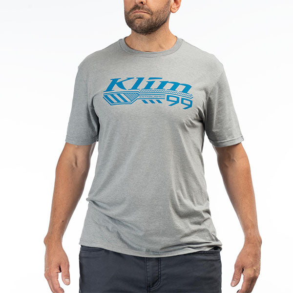 Professional studio photo of Klim Foundation Tri-Blend Tee; showing tee fit, printed graphics, and crew neckline; SKU 3690-000-120-134; Sizes: S-3XL