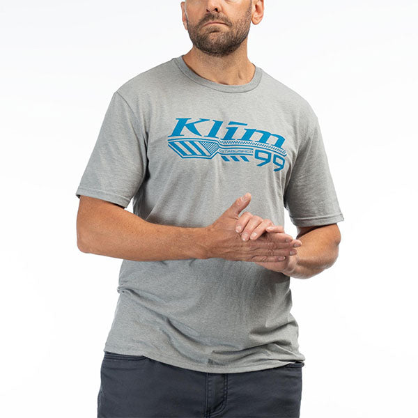 Crisp studio image on a white background of Klim Foundation Tri-Blend Tee; showing tee fit, printed graphics, and crew neckline; SKU 3690-000-120-134