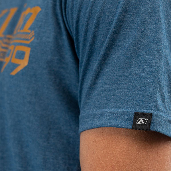 Professional studio photo of Klim Foundation Tri-Blend Tee; showing tee fit, printed graphics, and crew neckline; SKU 3690-000-120-134; Sizes: S-3XL