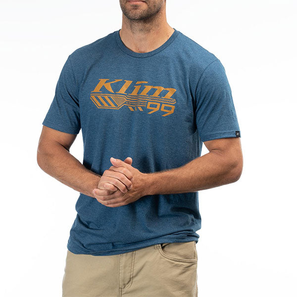 Studio photo on a white background of Klim Foundation Tri-Blend Tee; showing tee fit, printed graphics, and crew neckline; SKU 3690-000-120-134