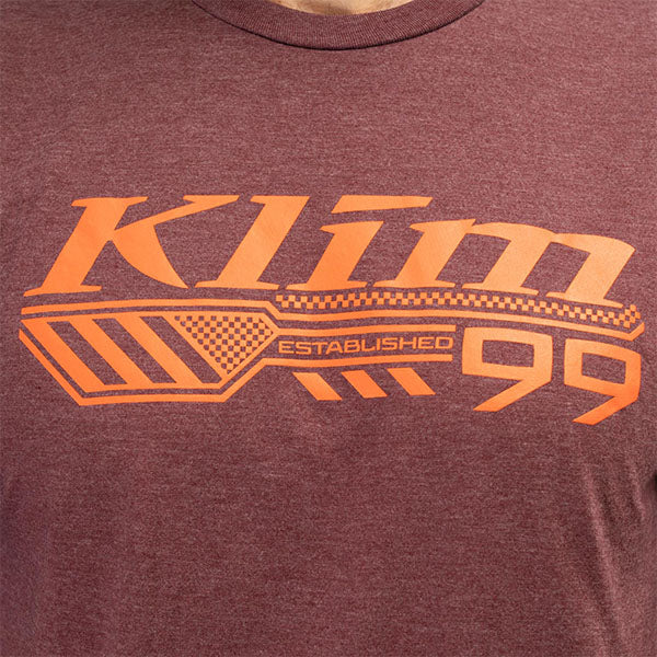 Studio photo on a white background of Klim Foundation Tri-Blend Tee; showing tee fit, printed graphics, and crew neckline; SKU 3690-000-120-134