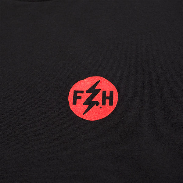 Professional studio photo of Fasthouse Eleanor Tee; showing tee fit, printed graphics, and crew neckline; SKU 3211540004; Colors: Black, Green