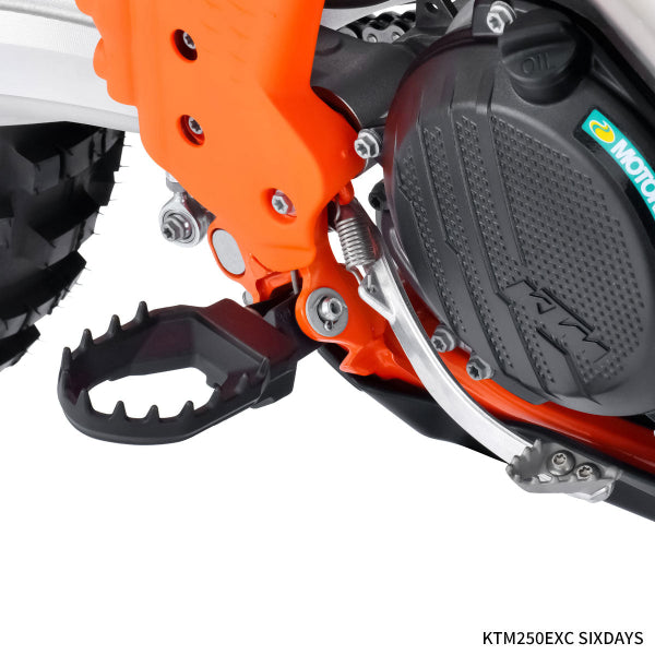 Studio photo on a white background of Zeta - Max Footpegs (Husqvarna); showing overall shape and visible design details; SKU 634-26; Sizes: 2023–2026