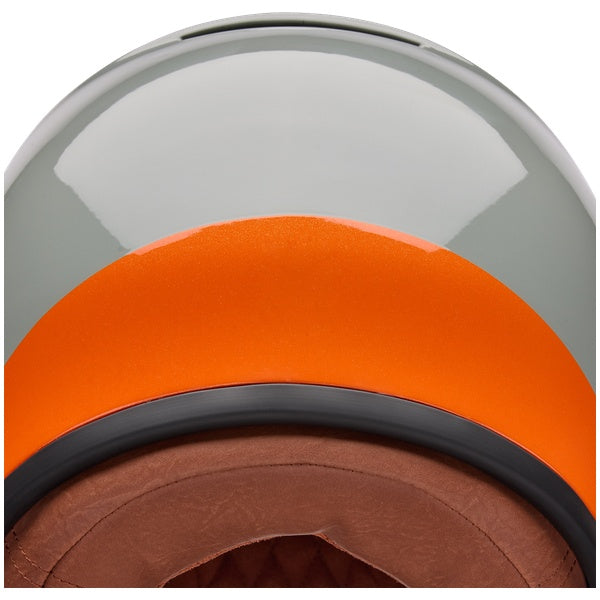 Bell TX501 Sprint helmet in Stone, close-up of orange rear shell accent and lower trim