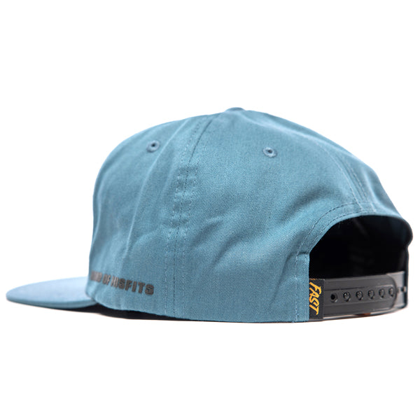 Fasthouse Spanner Hat SKU 3210050 – rear view showing adjustable snapback closure and yellow Fasthouse logo tag, designed for motocross lifestyle wear.