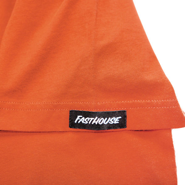 Professional studio photo of Fasthouse Stinger Tee; showing tee fit, printed graphics, and crew neckline; SKU 3211120104; Colors: Rust, Graphite Black