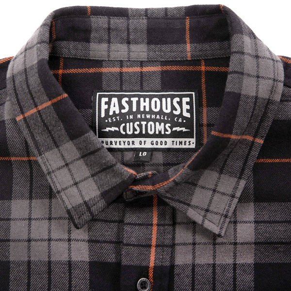 Crisp studio image on a white background of Fasthouse; showing flannel shirt fit, button front, and plaid pattern; SKU 3297925704