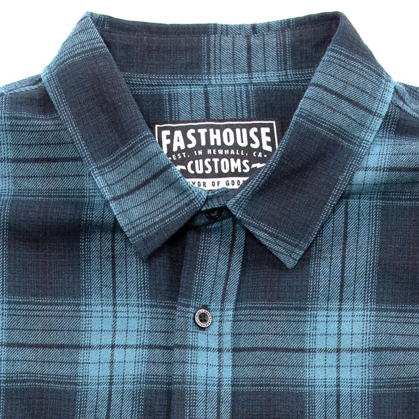 Crisp studio image on a white background of Fasthouse; showing flannel shirt fit, button front, and plaid pattern; SKU 3297920205