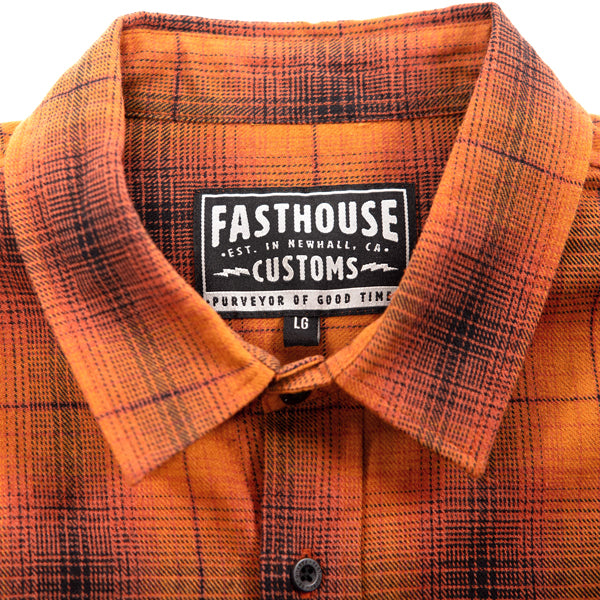 Crisp studio image on a white background of Fasthouse; showing flannel shirt fit, button front, and plaid pattern; SKU 3297920306