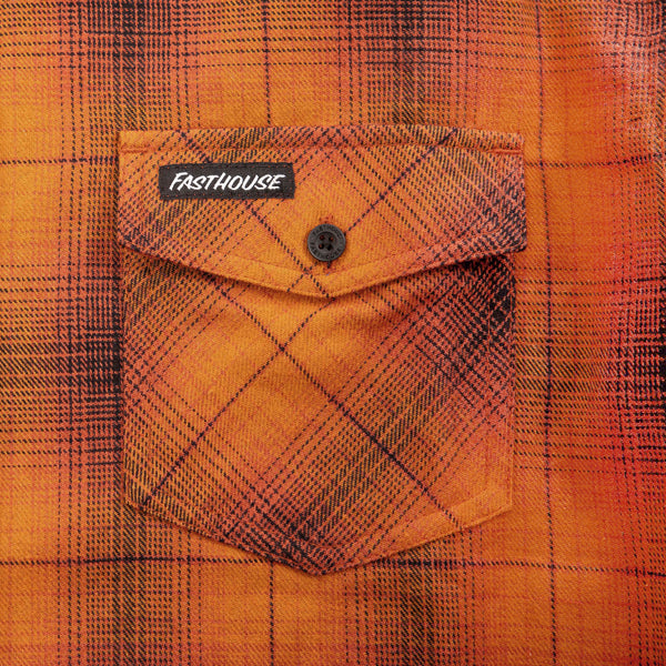 Studio photo on a white background of Fasthouse; showing flannel shirt fit, button front, and plaid pattern; SKU 3297920309