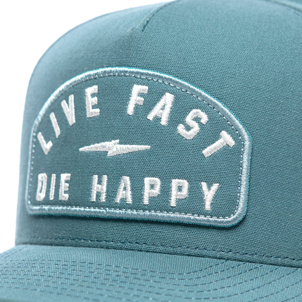 Close-up of Fasthouse Wired Hat SKU 3321098 showing embroidered front patch with bold white lettering