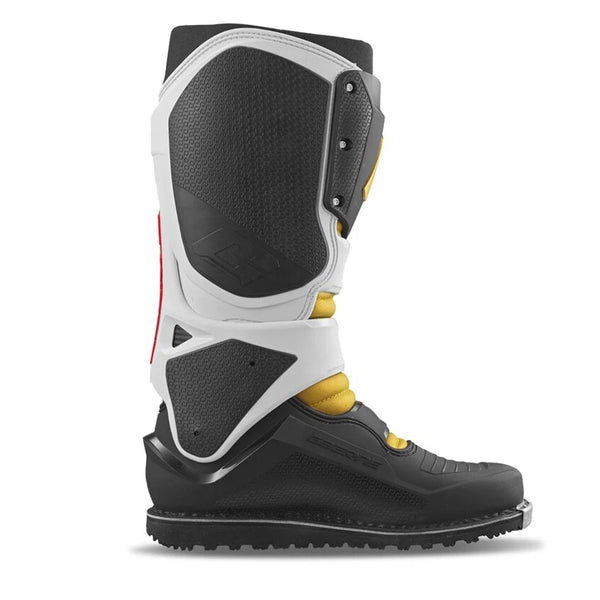 High-resolution studio image of Gaerne, SG-22 LE Jarvis 50th Anniversary Boots, Product image side view of Gaerne SG-22 LE Jarvis 50th Anniversary dirt bike boot highlighting tall white and black shin plate, yellow padding, and reinforced off-road sole for protection and support, Color: Red/Black/Grey, Sizes: 9 to 13, SKU: 480-66709, front view, Colors: Red/Black/Grey, SKU 480-667