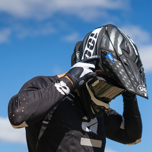 shoei black helmet man grabbing collection