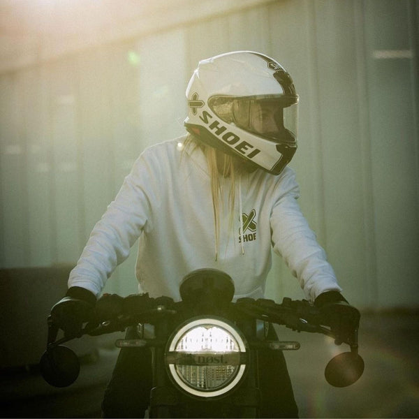 girl wearing white helmet while sitting on a bike collection